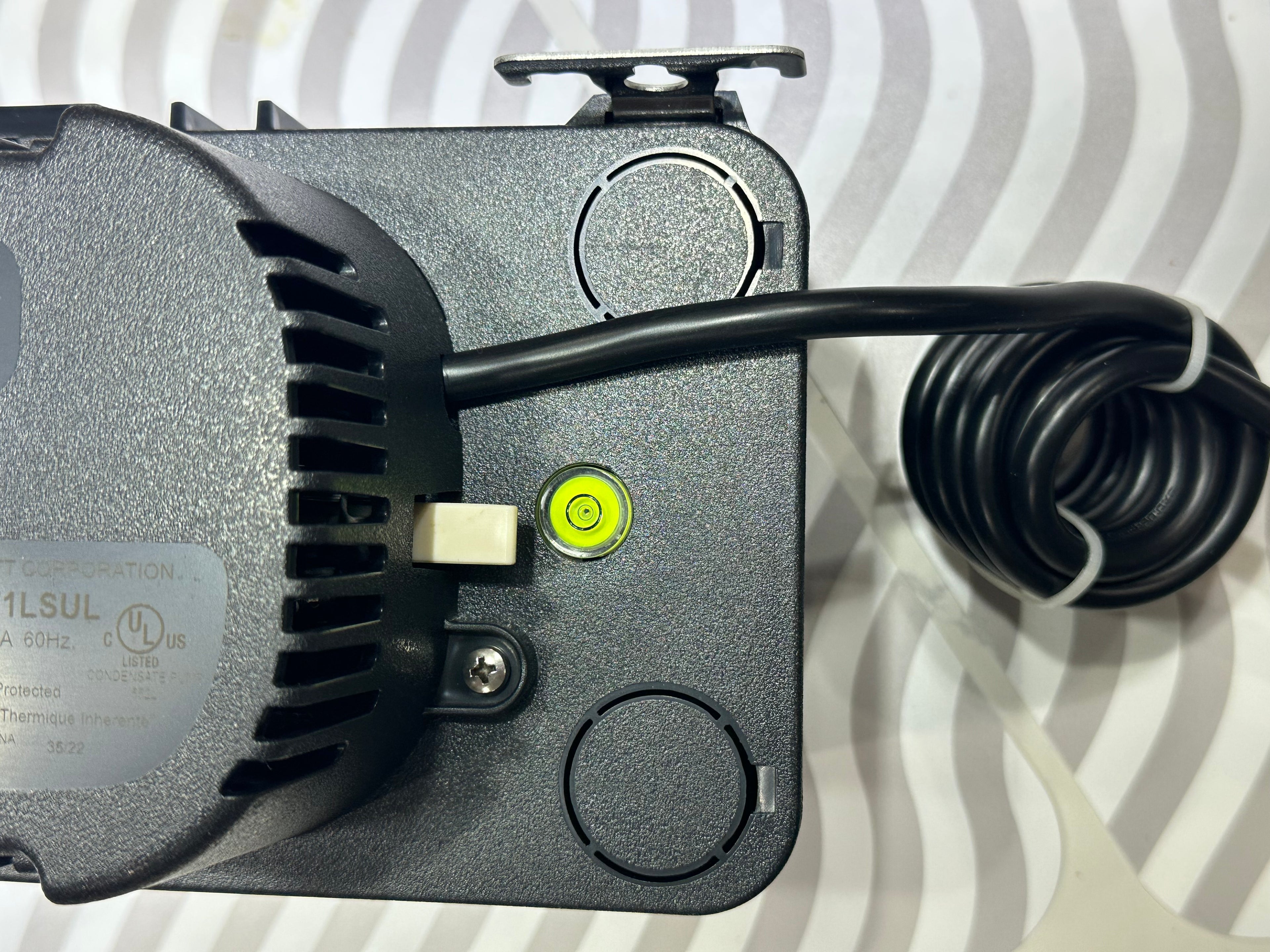 Condensate pump for furnace and AC