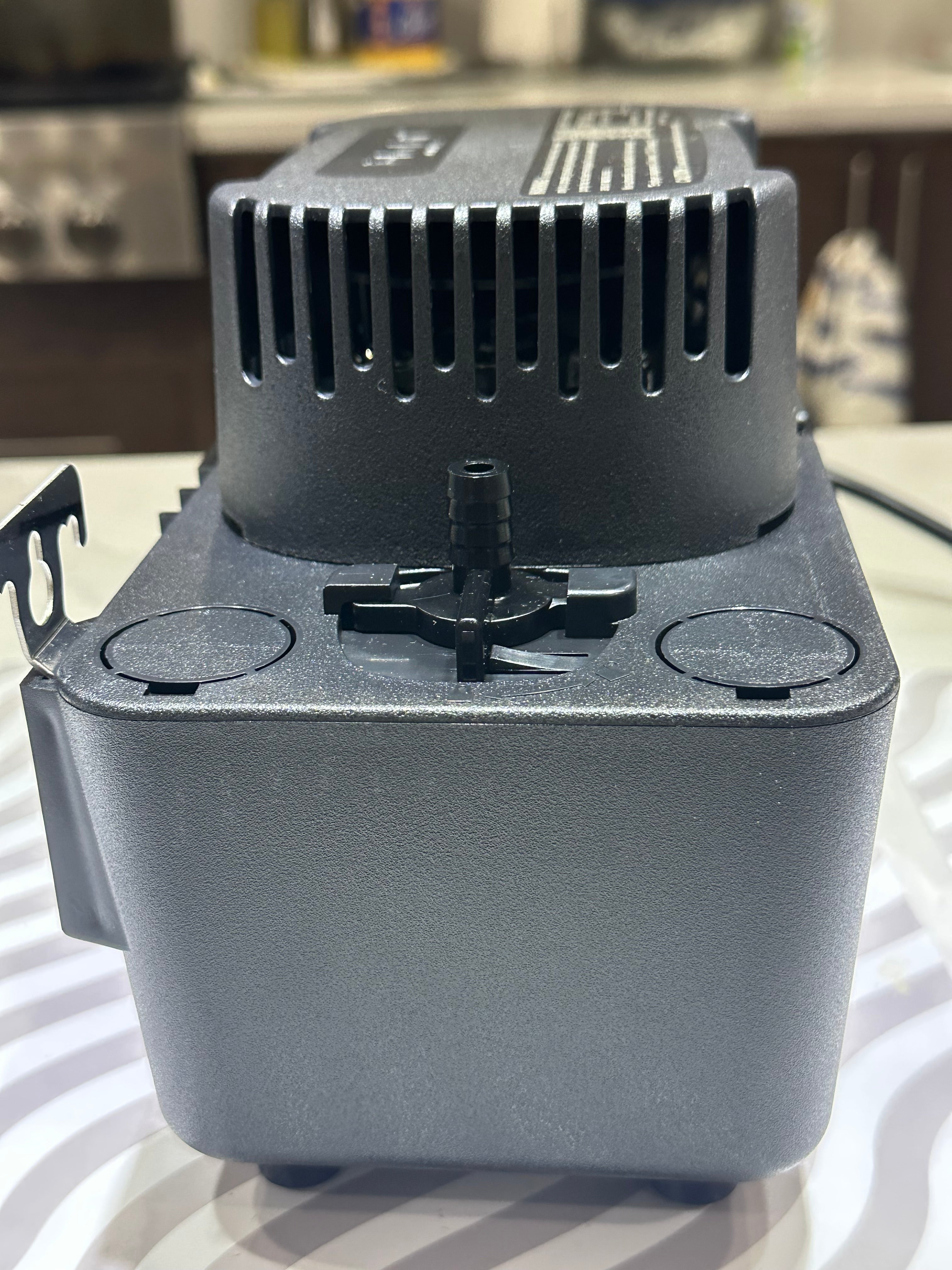 Condensate pump for furnace and AC