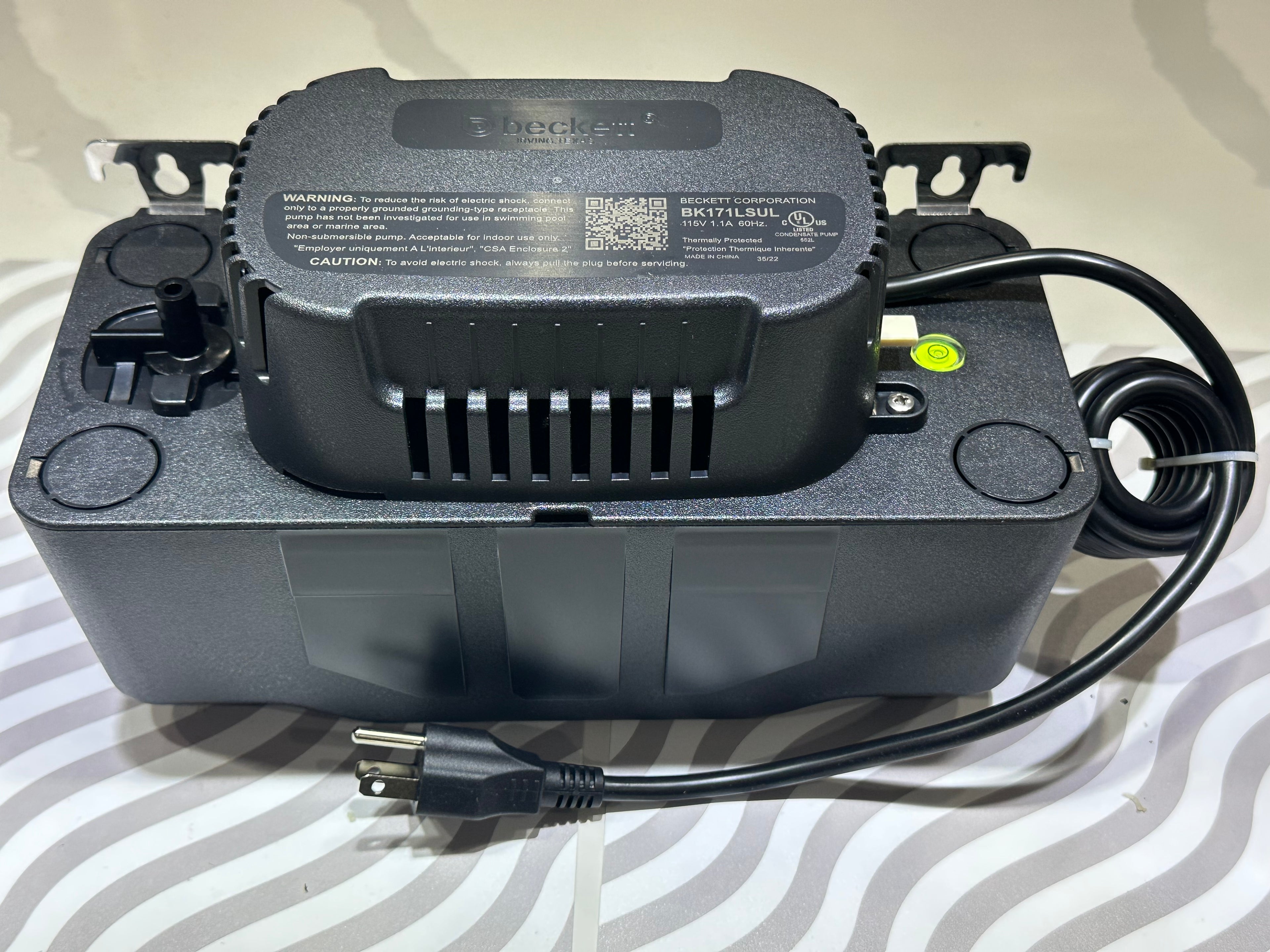 Condensate pump for furnace and AC